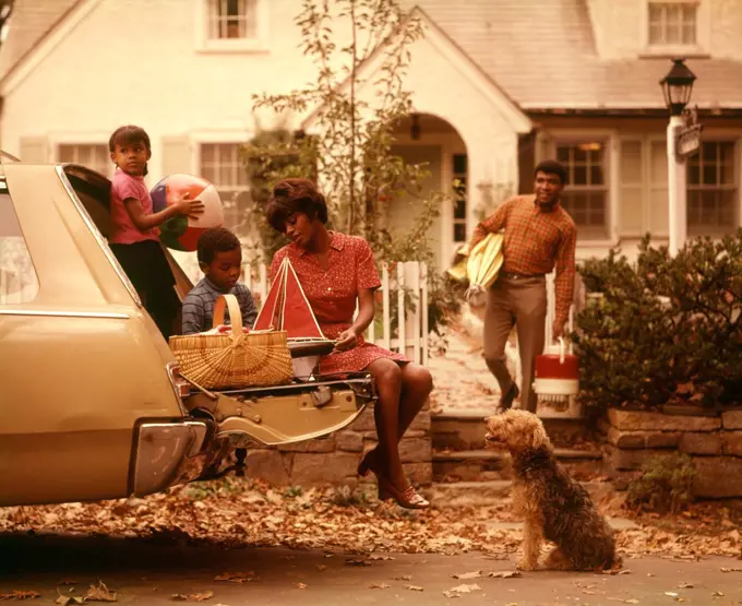 1970S African-American Family Loading Station Wagon Picnic Dog Mother Father Boy Girl Suburban   House