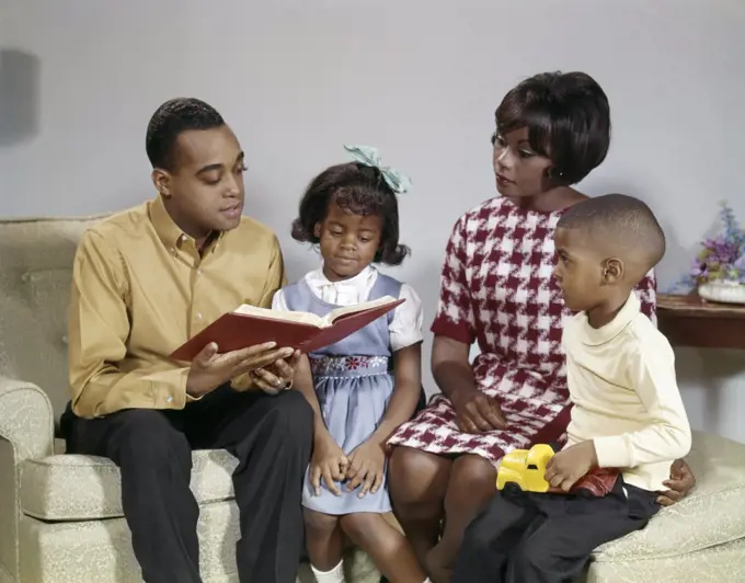 African American Family Reading A Book