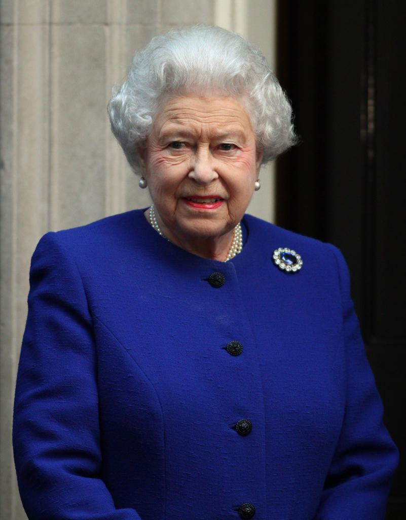 Queen Elizabeth II during a Royal Visit to Number 10 Downing Street, London, where she received a gift to mark the Diamond Jubilee and attended a Cabinet meeting as an observer. 18 December 2012