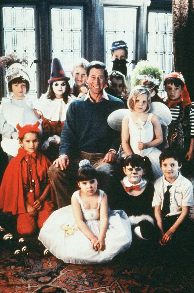 Prince Charles with children in fancy dress.  1 May 1994