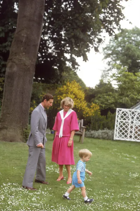 Charles, Prince of Wales, Princess Diana and their first son, Prince William of Wales (pictured nine days before his second birthday) on 12th June 1984.     Date: 1984