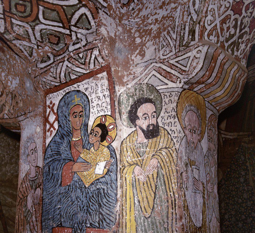 The rock hewn church of Abune Yemata in the Gheralta Mountains near Guh is renowned for its truly remarkable murals depicting Old and New Testament scenes and Saints.  The interior of the church has four free standing and six non free standing columns, all of which are colourfully decorated.