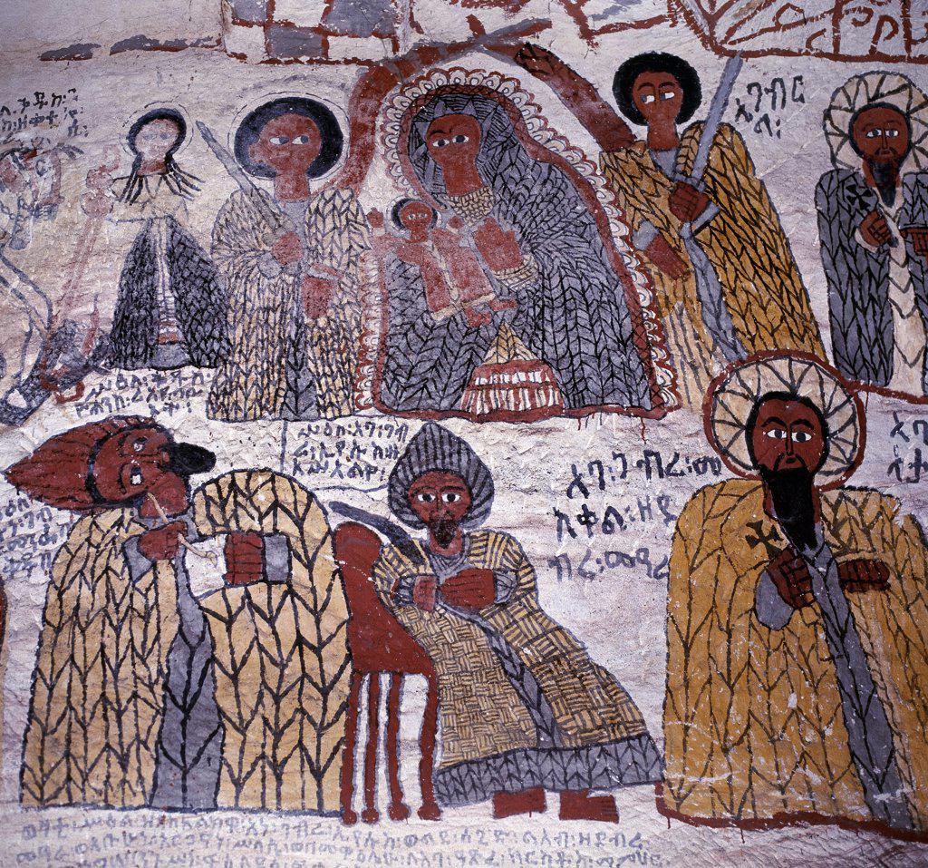 Fine murals decorate the interior of the rock hewn church of Yohannes Maequddi, a two hour walk from Degum on a plateau of the Gheralta Mountains east of Debretsion. The access to the church is along a narrow cleft between glaring sandstone.