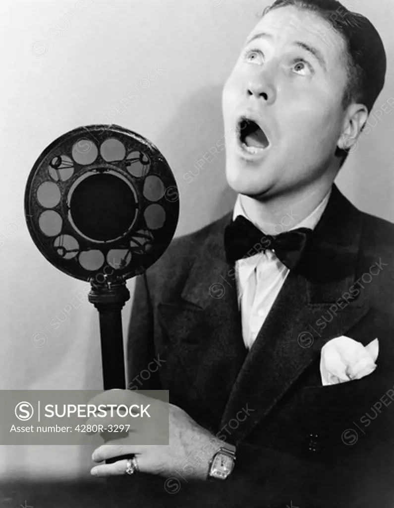 Man singing with radio microphone