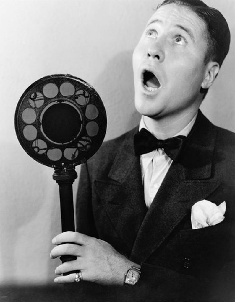 Man singing with radio microphone