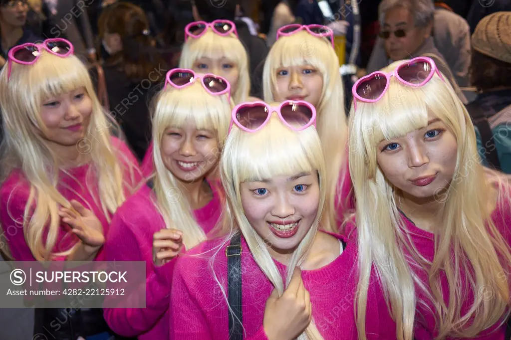 Group of young Japanese girls dressed as Barbie at the Halloween celebrations in Shibuya.