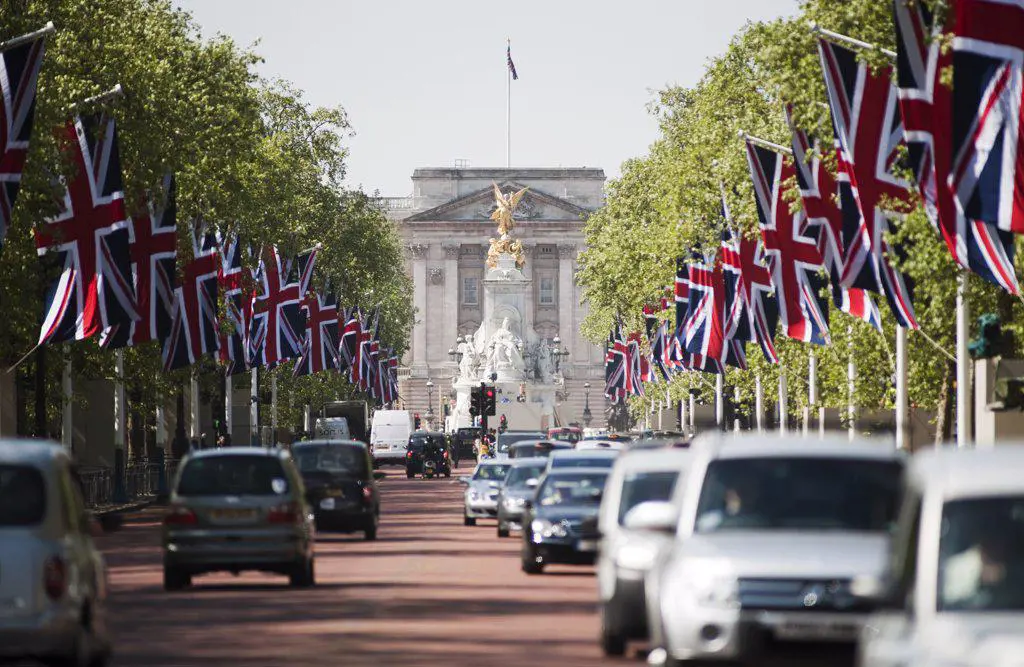 England, London, The Mall. View down The Mall towards Buckingham Palace with Union flags lining the route of the Royal Wedding.