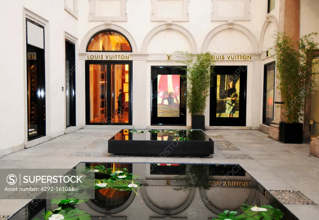 Italy, Lombardy, Milan, Via Montenapoleone, Louis Vuitton fashion shop -  SuperStock