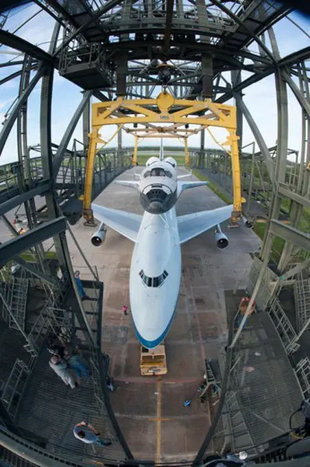 USA, Florida, Cape canaveral, Kennedy Space Center, Elevated View of Endeavour space shuttle lifting on top of 747 shuttle carrier aircraft