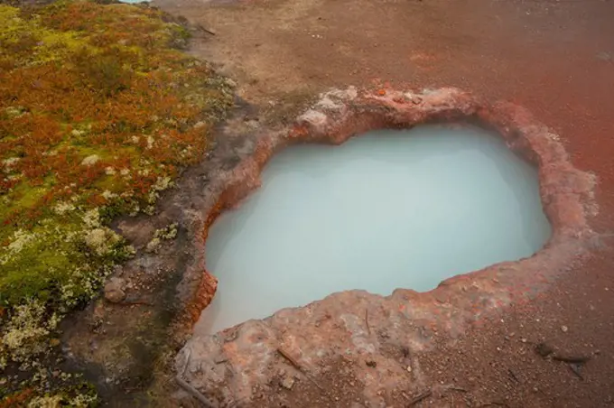 USA, Wyoming, Elevated view of small thermal pool in Yellowstone National Park