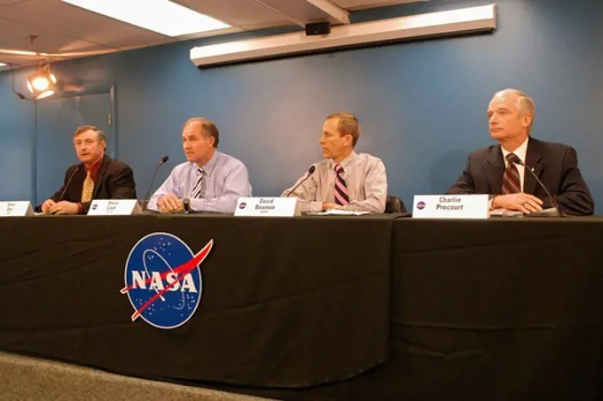NASA and ATK chiefs at a press conference following final test firing of a space shuttle solid rocket booster.