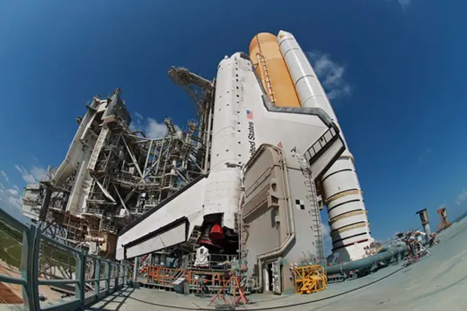 The Shuttle Discovery is poised for launch on its final mission, STS-133, after rollout to Pad 39A on September 21, 2010.