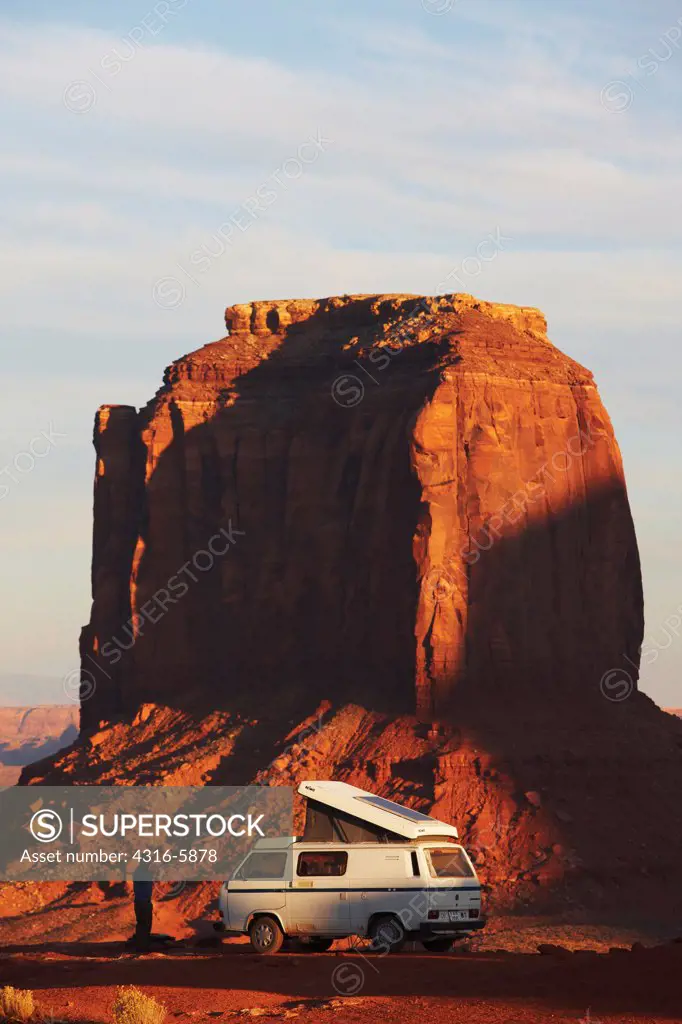 USA, Arizona, Monument Valley, Camper Van and distant Mitchell Butte