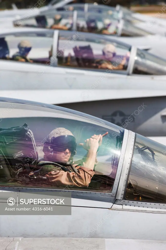 Malaysia, Kuantan Air Base, United States Marine Corps aviators in cockpits of F/A-18D Hornets
