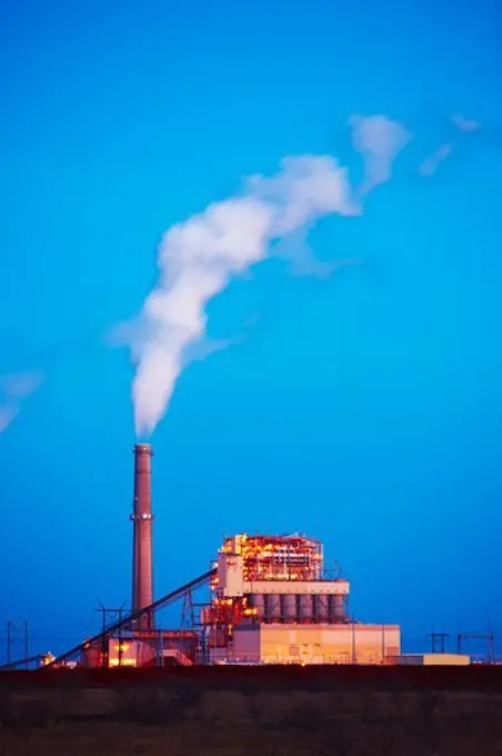 Coal burning electricity production facility at dusk, Oklaunion, Wilbarger County, Texas, USA