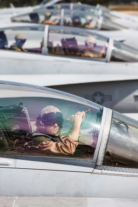 Malaysia, Kuantan Air Base, United States Marine Corps aviators in cockpits of F/A-18D Hornets
