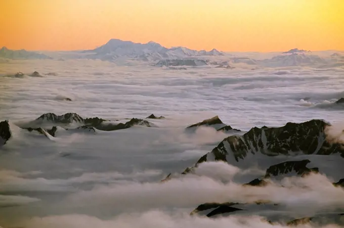 Clouds and Distant Peaks at Dusk in Canada's Icefield Ranges
