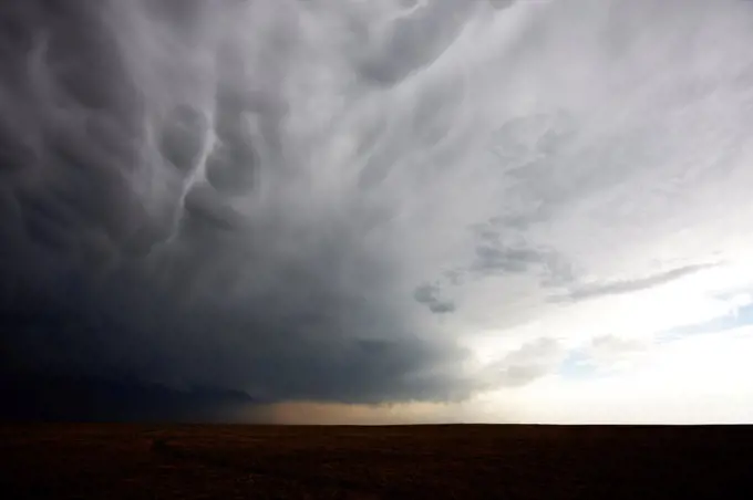 Massive thunderstorm, showing mammatus cloud forms, Colorado