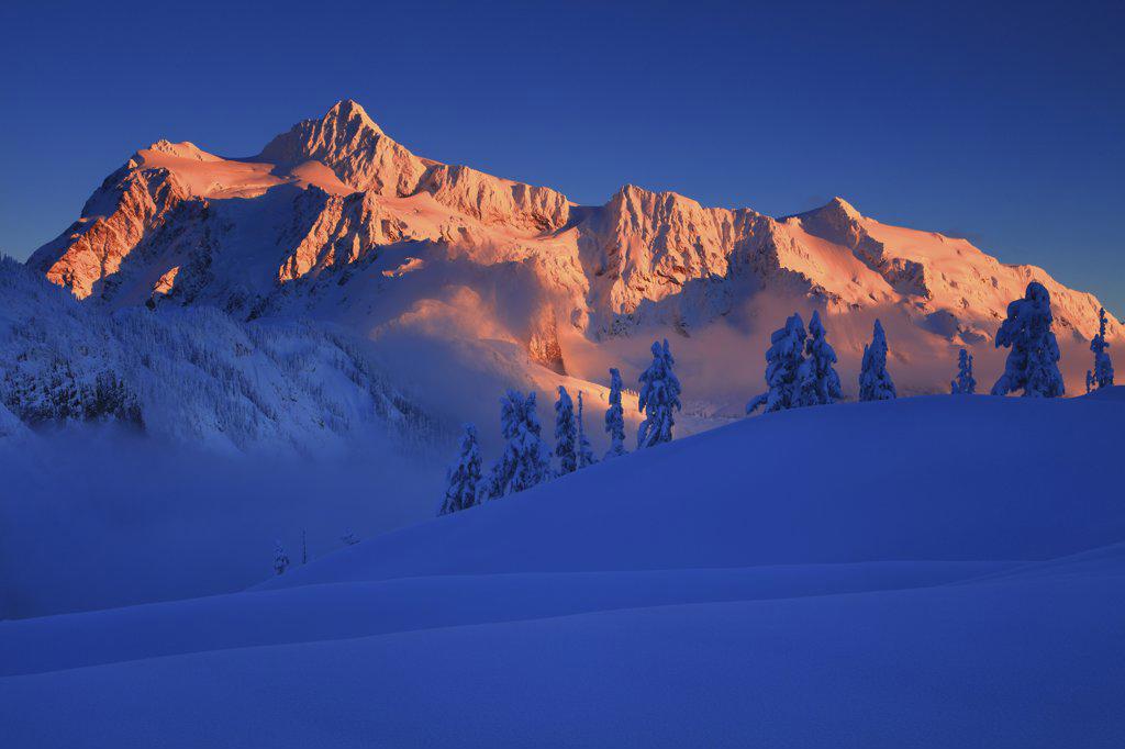 Sunset Winter Scene With Mt Shuksan Emerging From the Clouds From Artist Ridge in the Mt Baker National Recreation Area in Washington
