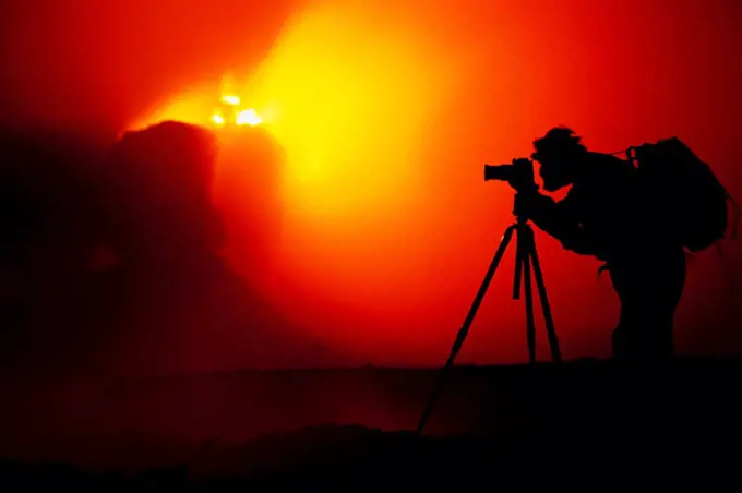 Photographer Silhouetted by Erupting Spatter Cones within Pu'u O'o Vent
