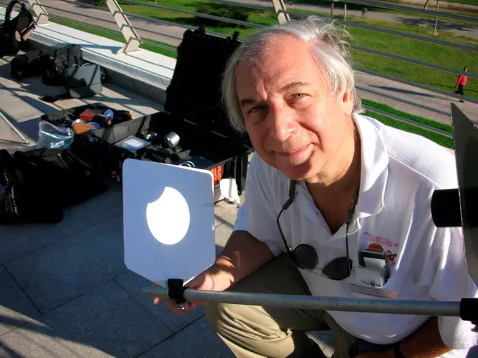 Image showing solar eclipse projected through telescope onto piece of paper
