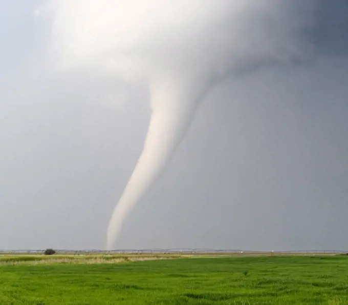 Milky White Tornado Spins Across Farmland, North central Nebraska, USA