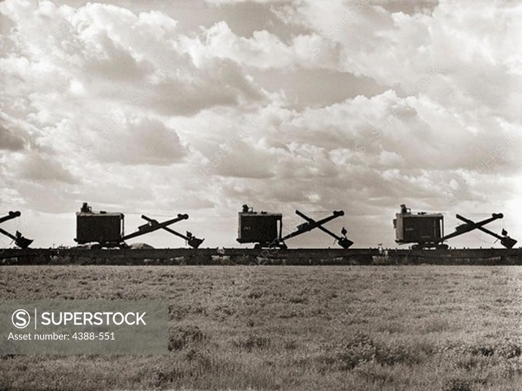 Stock Photo: 4388-551 Line of Steam Shovels