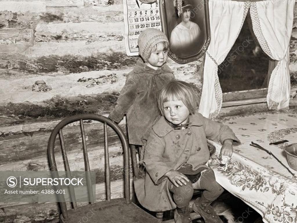 Stock Photo: 4388-601 Children in Timber House