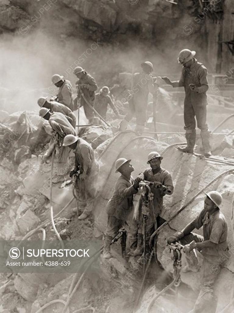 Stock Photo: 4388-639 Construction Workers on Dam