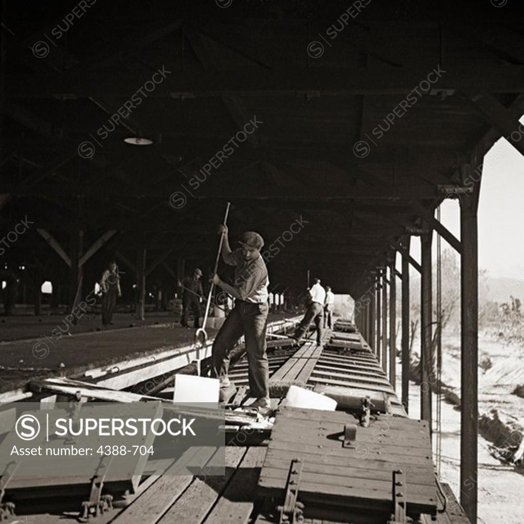 Stock Photo: 4388-704 Dropping Ice into Refrigerator Cars