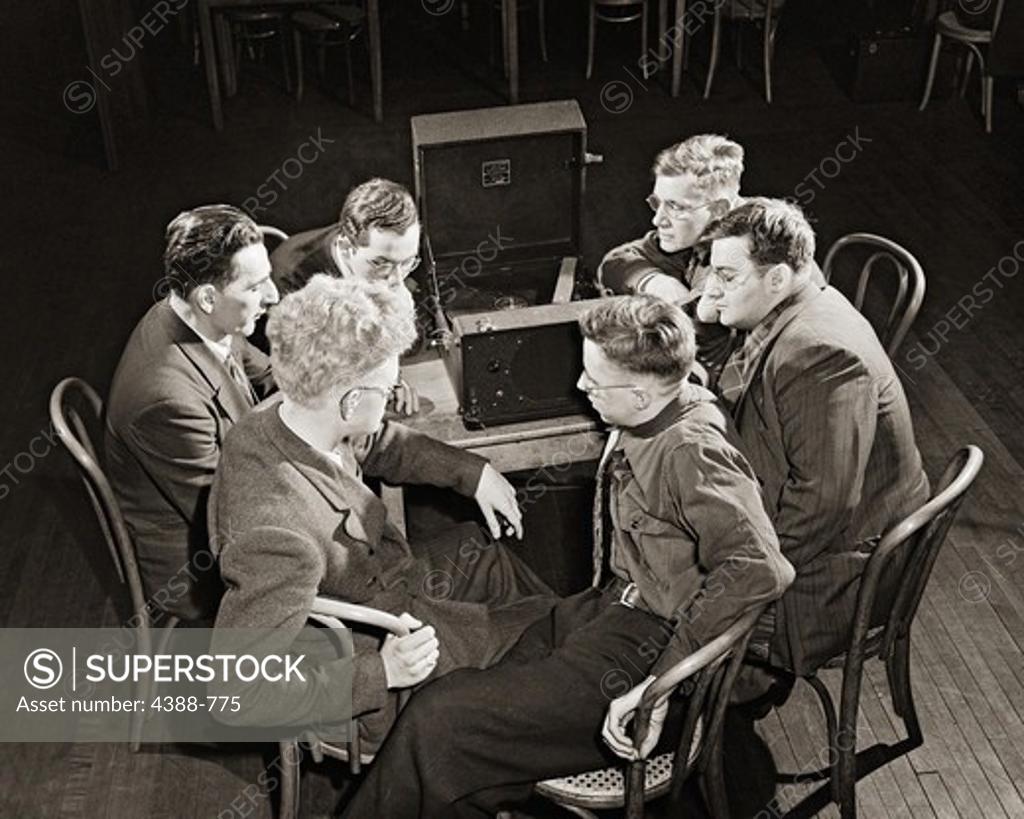 Stock Photo: 4388-775 Listening to the Talking Book