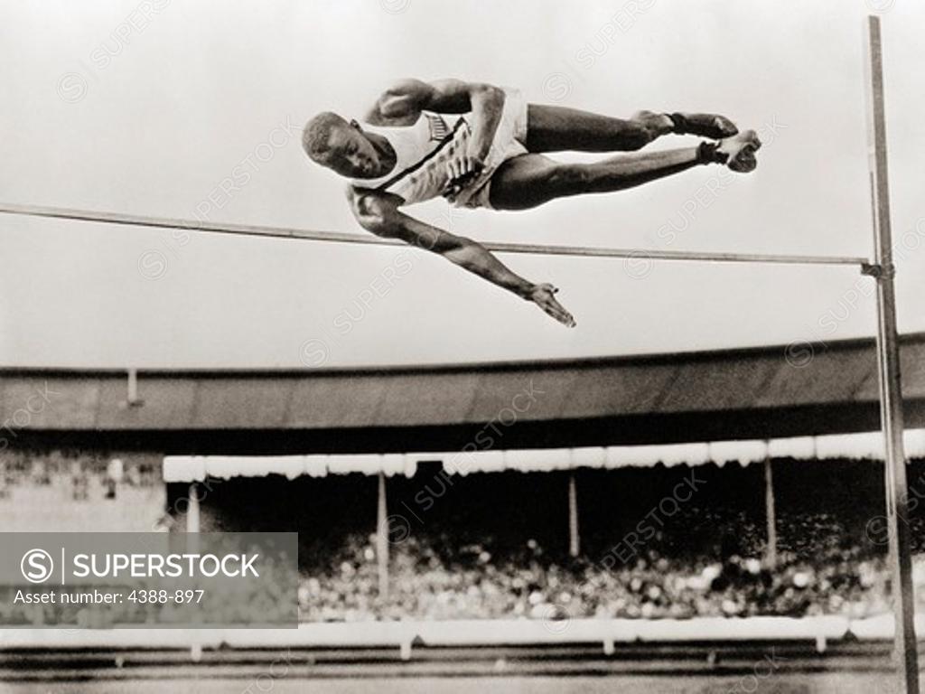 Stock Photo: 4388-897 Athlete in High Jump