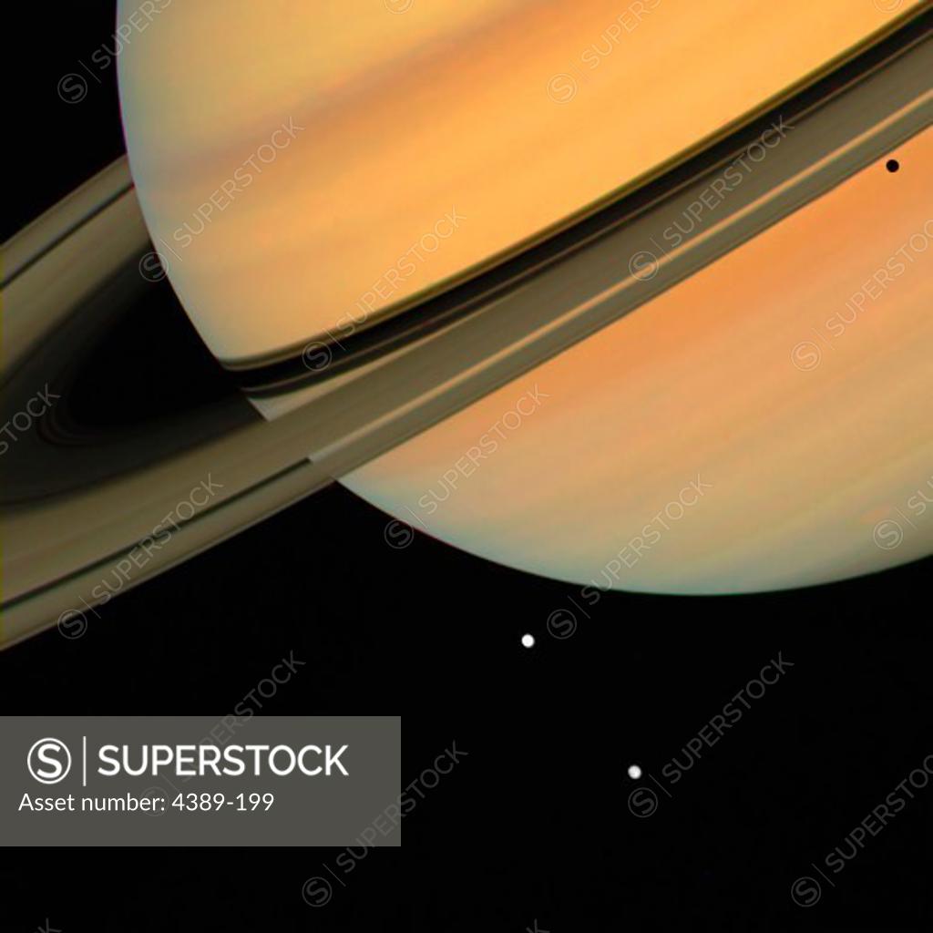 Stock Photo: 4389-199 Saturn with Two Moons Tethys and Dione, From Voyager 1