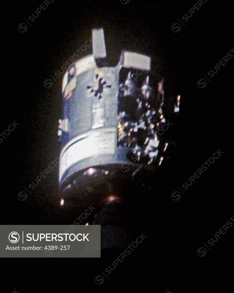 Stock Photo: 4389-257 Damaged Apollo 13 Service Module is Let Loose to Drift