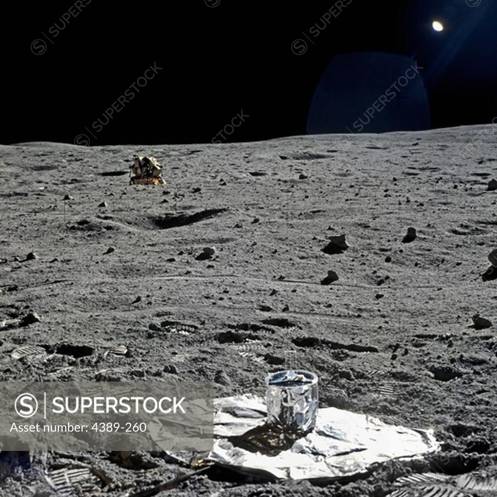 Stock Photo: 4389-260 Apollo 16 - Lunar Module Dwarfed in a Lunar Landscape