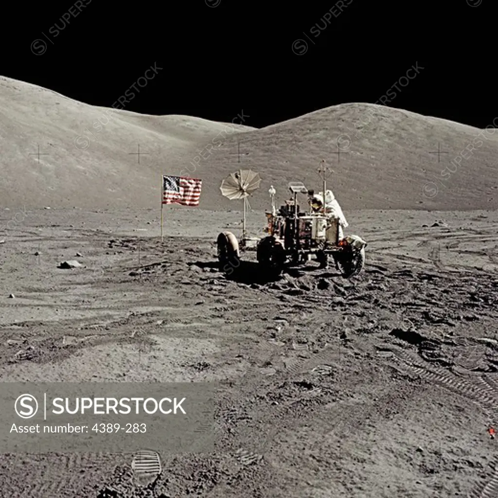 An Apollo 17 Astronaut and Lunar Rover in a Moon Valley