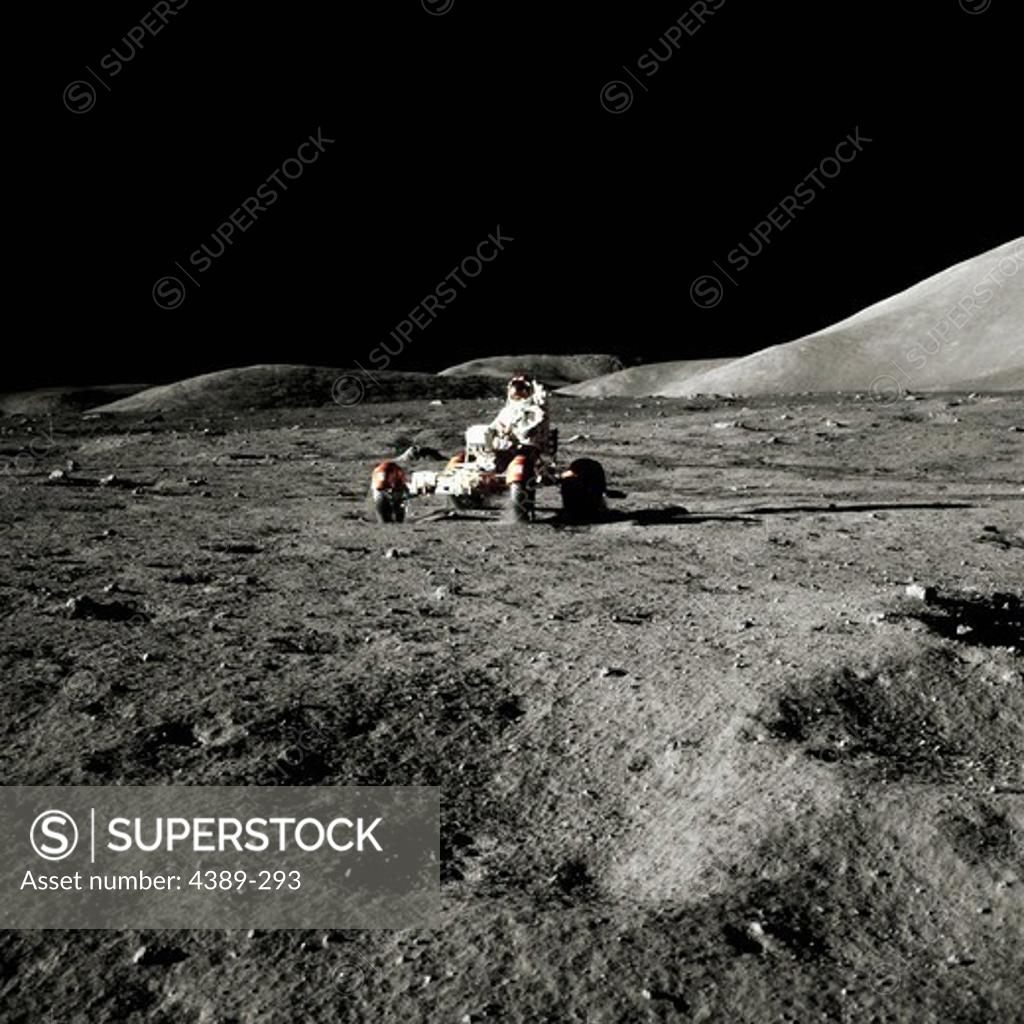 Stock Photo: 4389-293 Apollo 17 Astronaut Driving a Lunar Rover