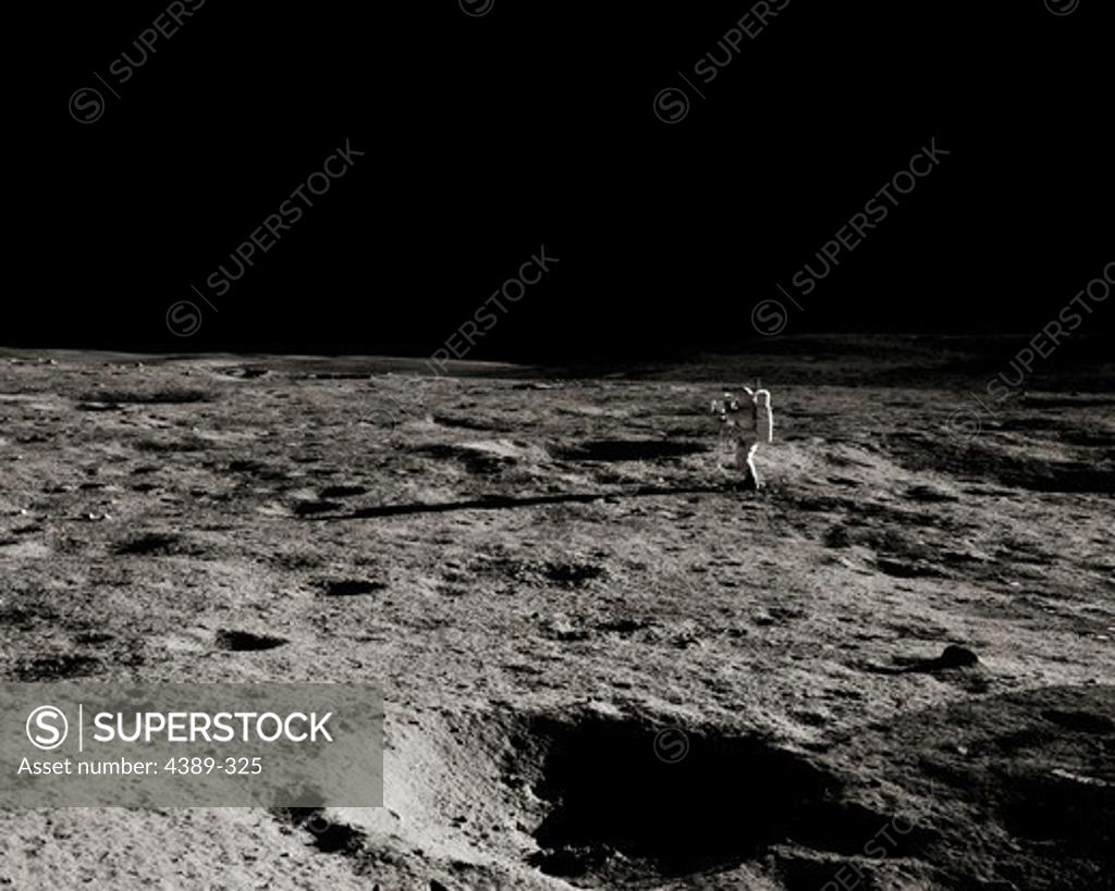 Stock Photo: 4389-325 A Lone Apollo 14 Astronaut on a Barren World
