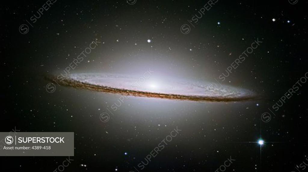 Stock Photo: 4389-418 The Sombrero Galaxy Sparkles in the Night Sky