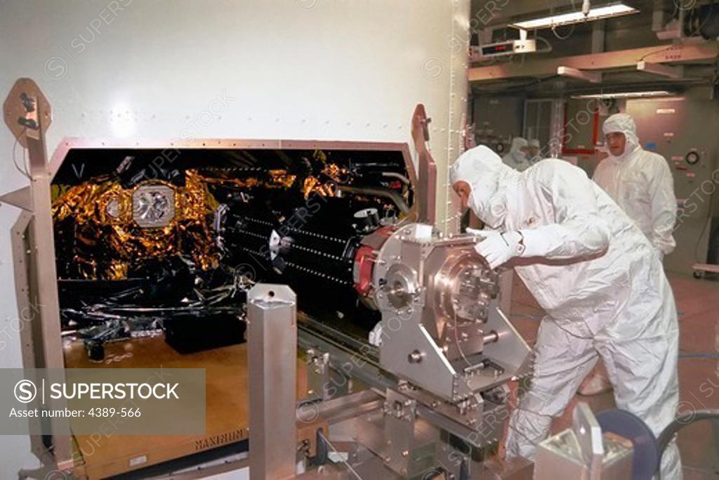 Stock Photo: 4389-566 Installing Power Supply on Cassini Probe