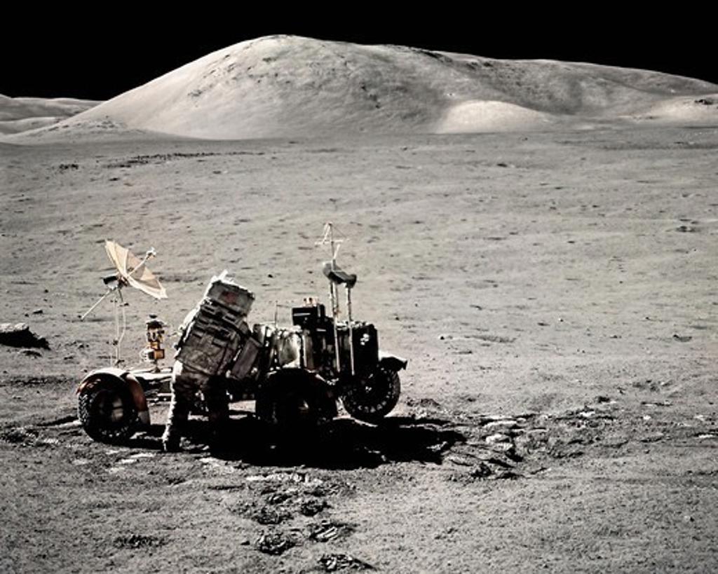 An Apollo 17 Astronaut and Lunar Rover in a Moon Valley