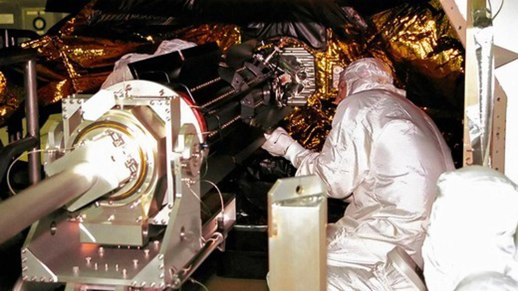 Installing Power Supply on Cassini Probe