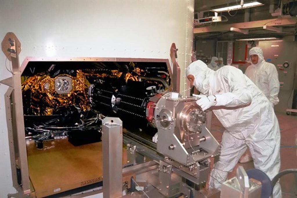Installing Power Supply on Cassini Probe