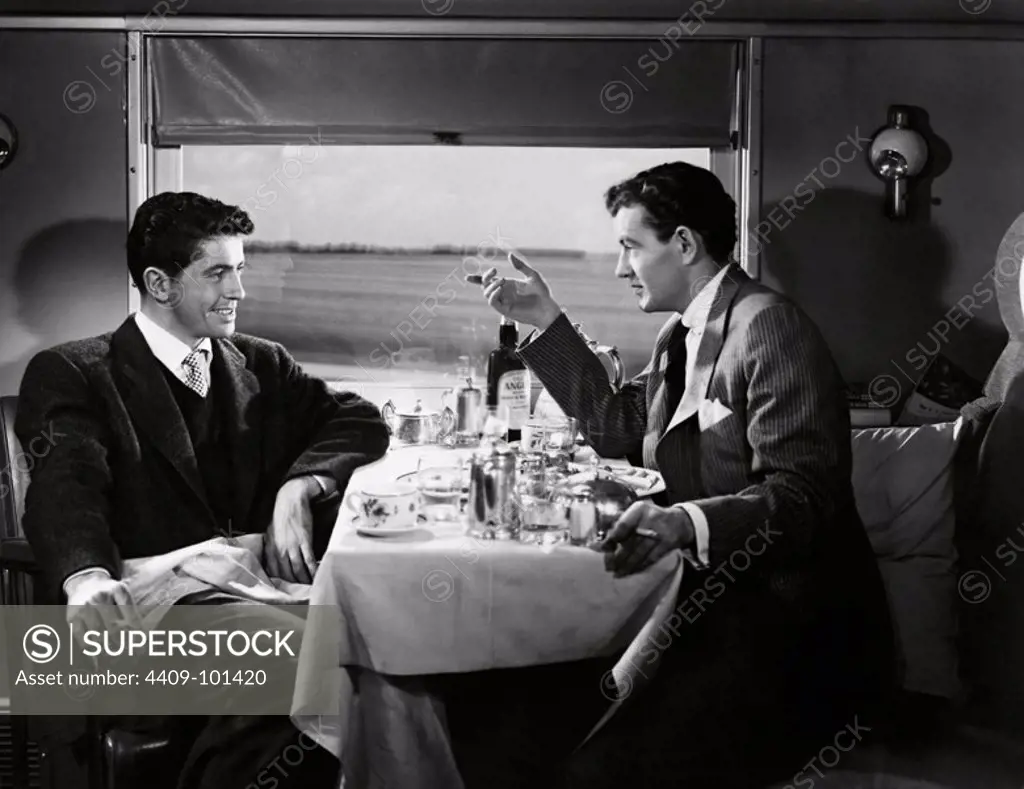 ROBERT WALKER and FARLEY GRANGER in STRANGERS ON A TRAIN (1951), directed by ALFRED HITCHCOCK.