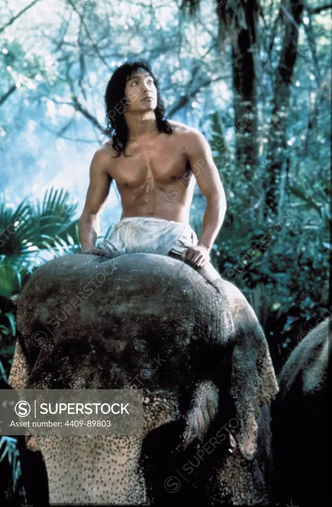 JASON SCOTT LEE in THE JUNGLE BOOK (1994), directed by STEPHEN SOMMERS. -  SuperStock