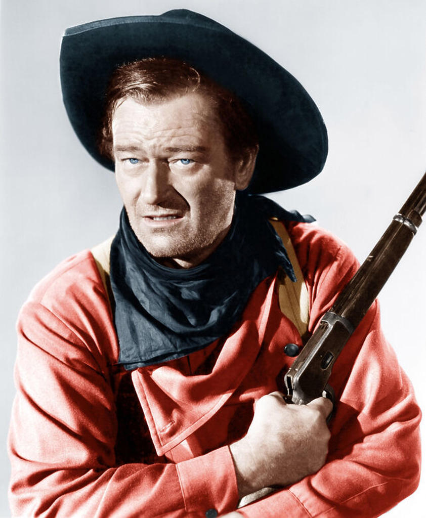 JOHN WAYNE in THE SEARCHERS (1956), directed by JOHN FORD.