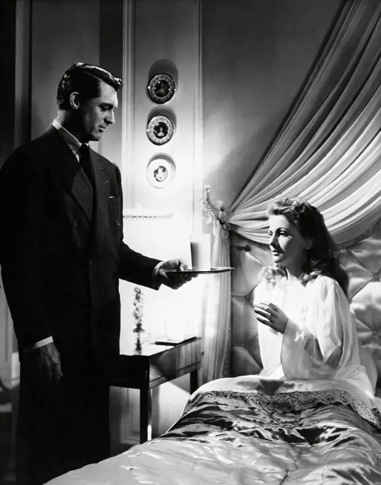 CARY GRANT and JOAN FONTAINE in SUSPICION (1941), directed by ALFRED HITCHCOCK.