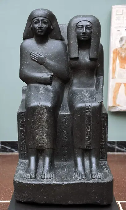 Statue group of the egyptian priest Ahmose and his mother, Baket-re. Diorite. C.1490-1400 BC. 18th Dynasty. New Empire. Ny Carlsberg Glyptotek Museum. Copenhagen. Denmark.
