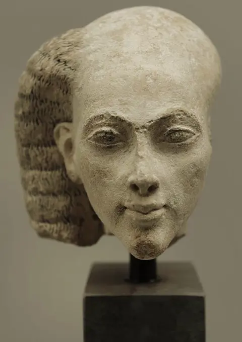Head from a statuette of a princess. Limestone. Probably from el-Amarna, Egypt. Amarna Period, c. 1365-1347 BC. Ny Carlsberg Glyptotek. Copenhagen. Denmark.