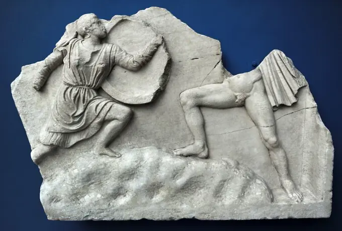 Relief with Amazonomachy. Athens, Greece. 2nd century AD. Marble. An Amazon wearing a short tunic and helmet is in combat with a naked Greek in a rocky landscape. Ny Carlsberg Glyptotek. Copenhagen, Denmark.